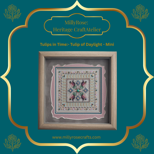Square close-up of the completed Tulip of Daylight Mini embroidery showing warm golden cross-stitching, amber crystals, and coral seed beads framed elegantly.