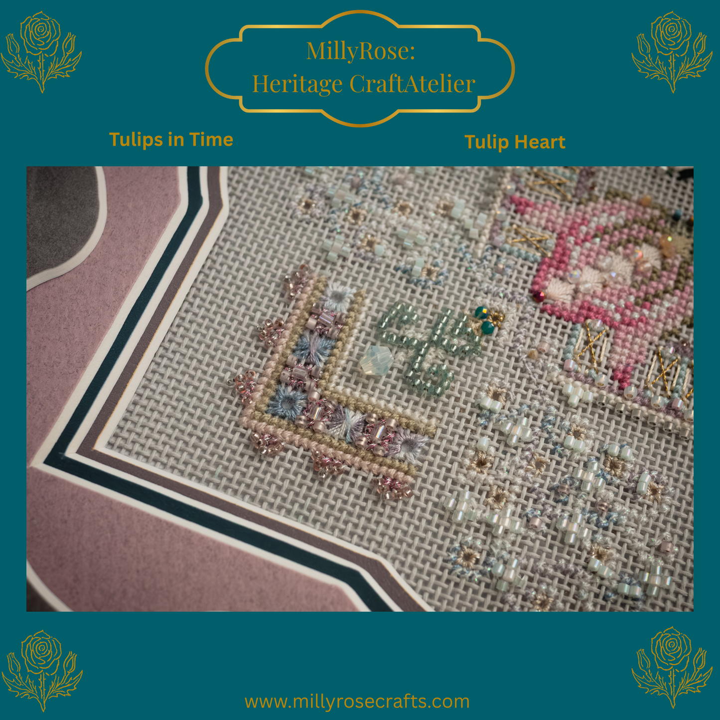 Completed Tulip Heart needlework piece featuring symmetrical pastel tulips, hand-dyed silks, and green crystals in a luxury teal frame with a scalloped mount.
