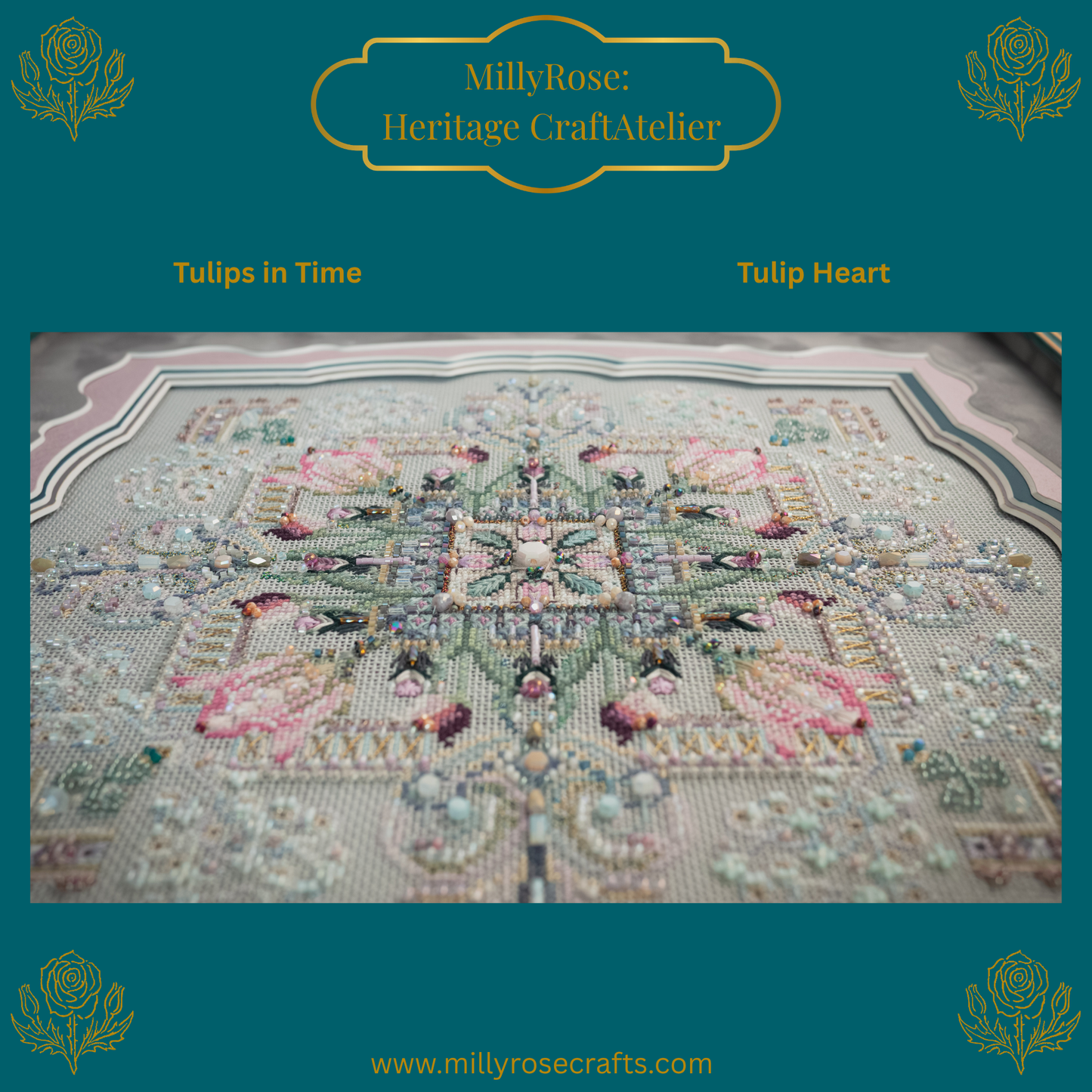 Completed Tulip Heart needlework piece featuring symmetrical pastel tulips, hand-dyed silks, and green crystals in a luxury teal frame with a scalloped mount.